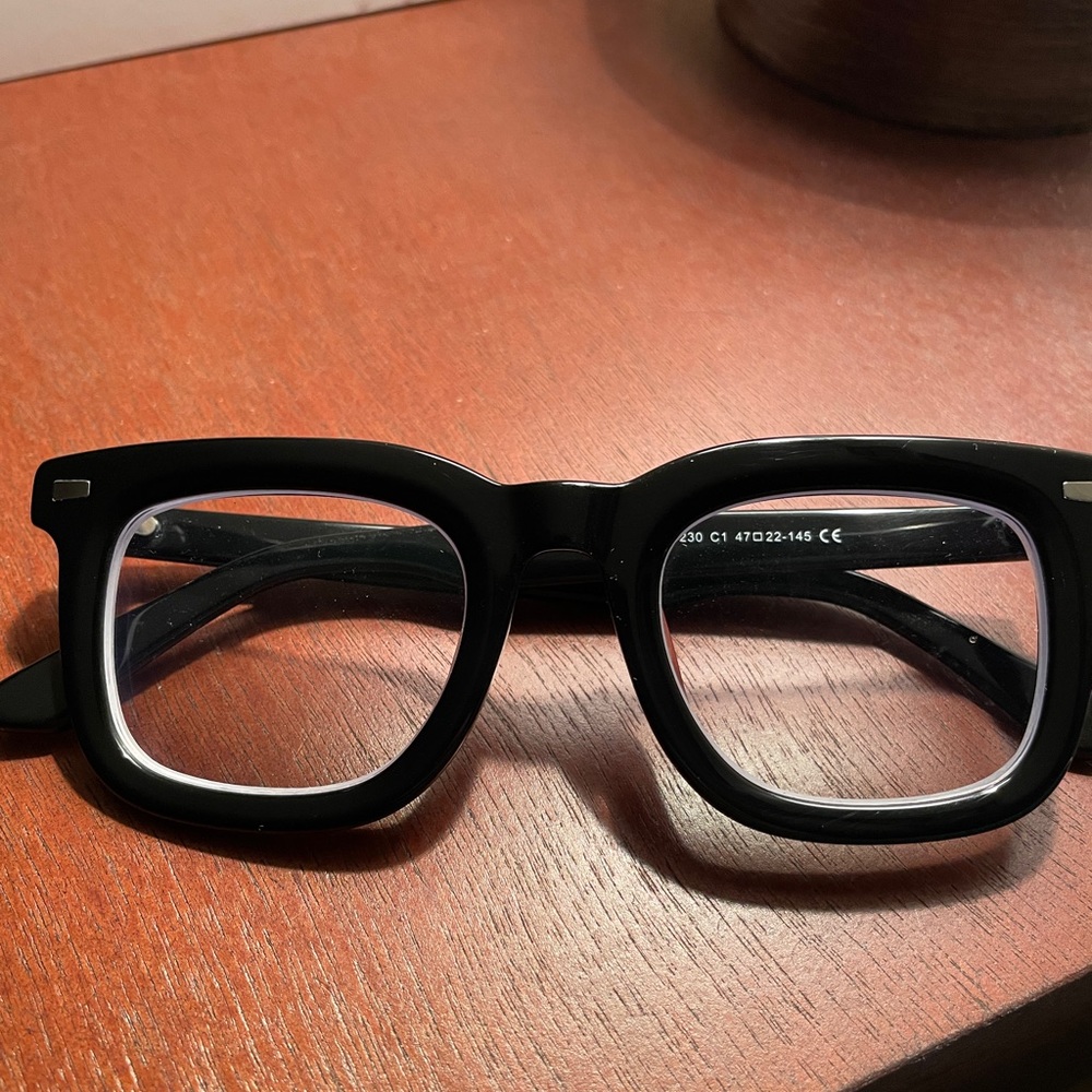 Thick framed eyeglasses